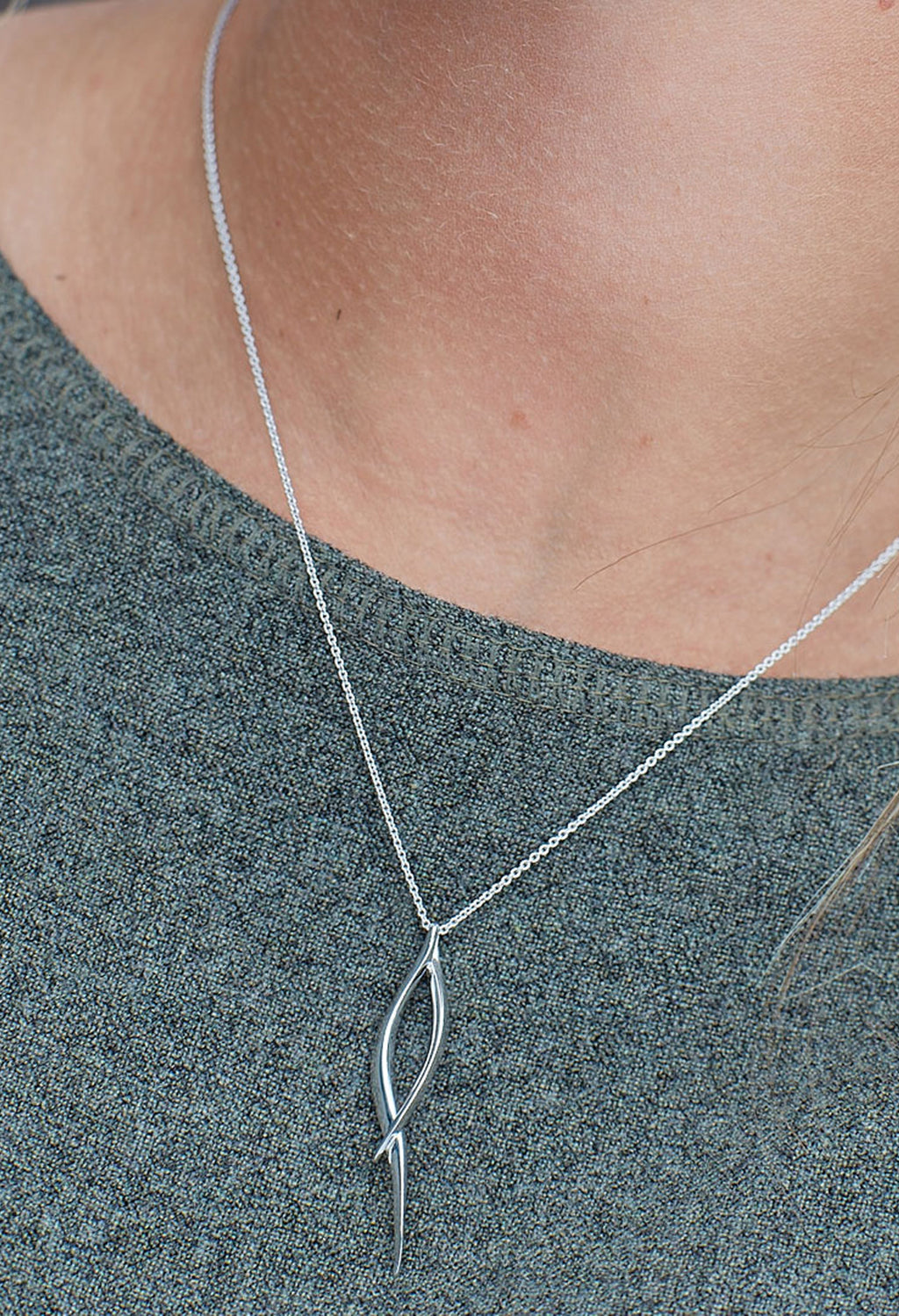 The Kit Heath Entwine Twine Twist Necklace, a silver necklace from Kit Heath, available at OD’s Jewellers in St Helens.