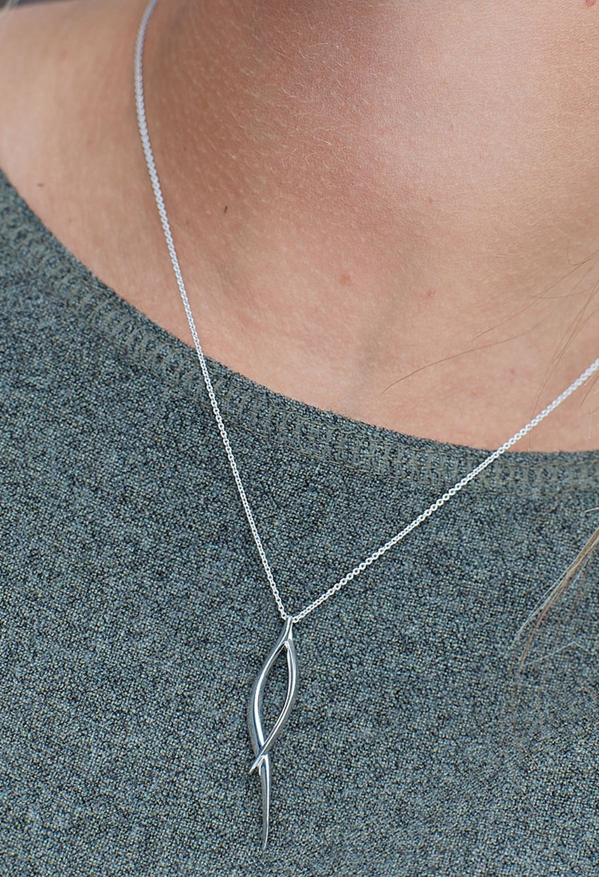 The Kit Heath Entwine Twine Twist Necklace, a silver necklace from Kit Heath, available at OD’s Jewellers in St Helens.