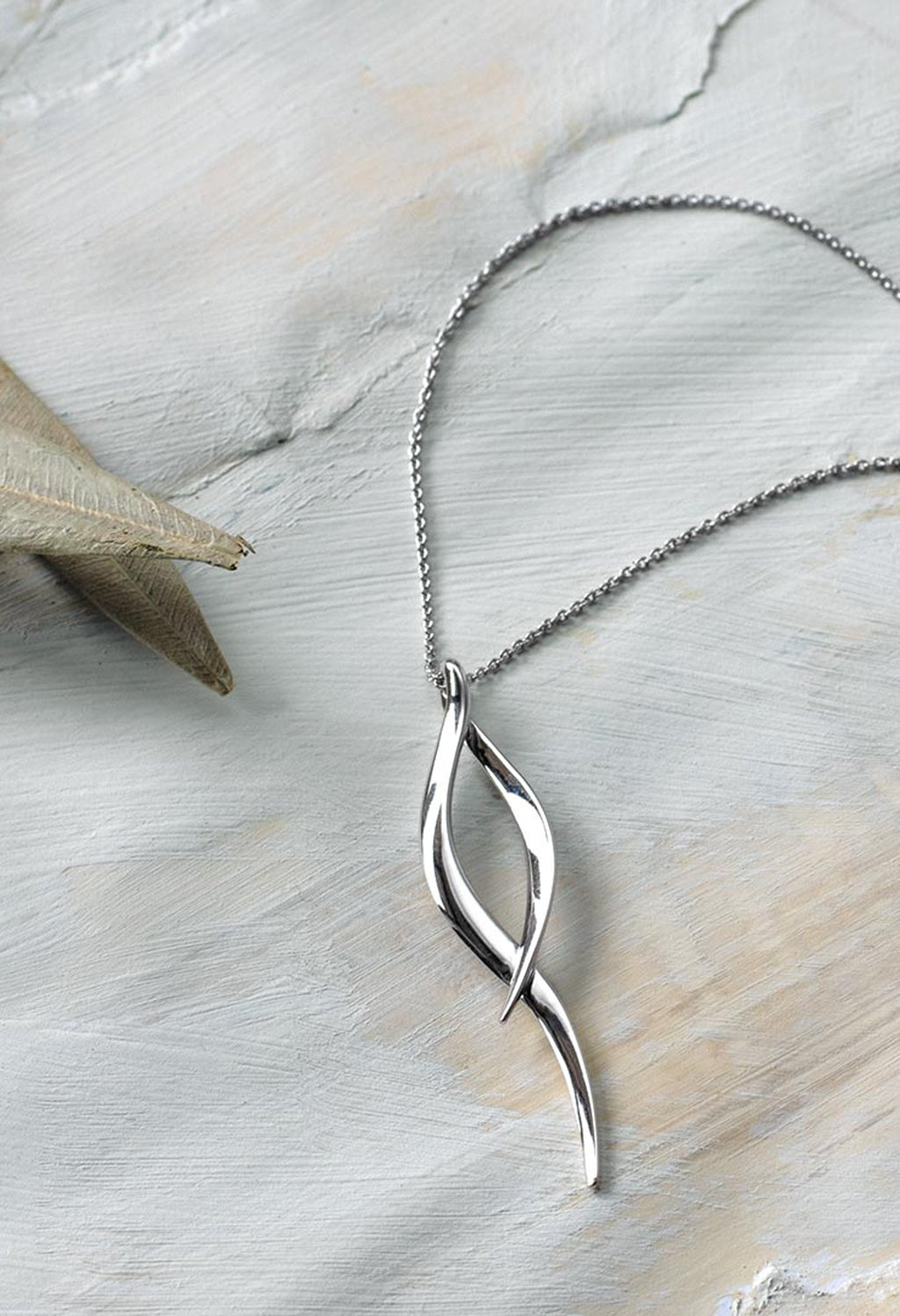 The Kit Heath Entwine Twine Twist Necklace, a silver metal necklace from Kit Heath, available at OD’s Jewellers in St Helens.
