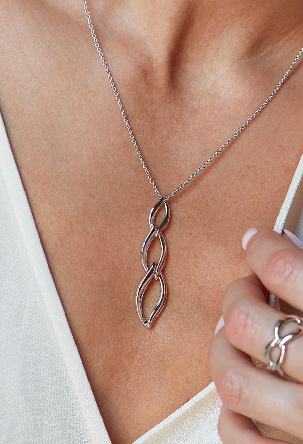 Kit Heath Entwine Twine Trio Link Necklace, a silver necklace from Kit Heath, available at OD’s Jewellers in St Helens.
