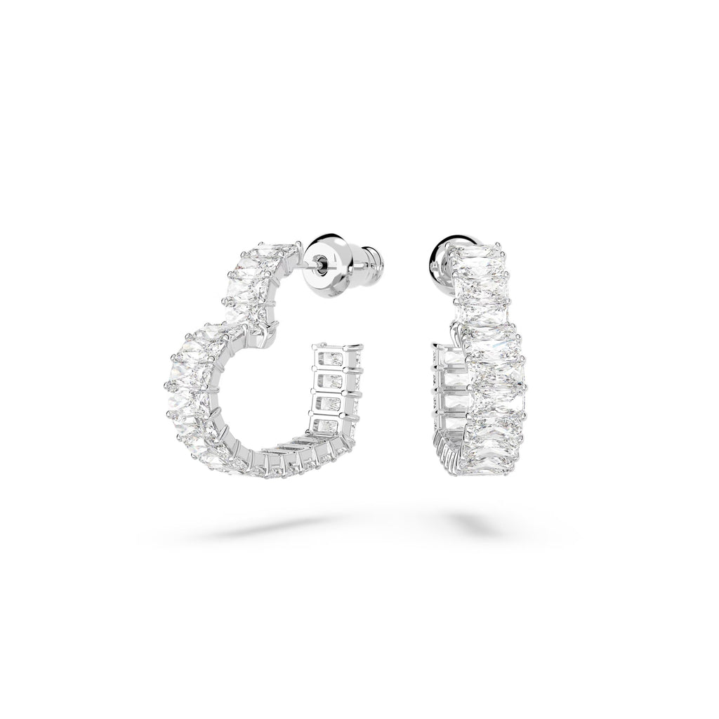 The Swarovski Matrix Small Heart Hoop Earrings, a silver rhodium-plated jewelry from Swarovski, available at OD’s Jewellers in St Helens.