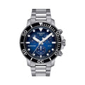 Close-up of the Tissot Seastar 1000 watch, a precise diver-style timepiece. Displays the blue dial, stainless steel band,