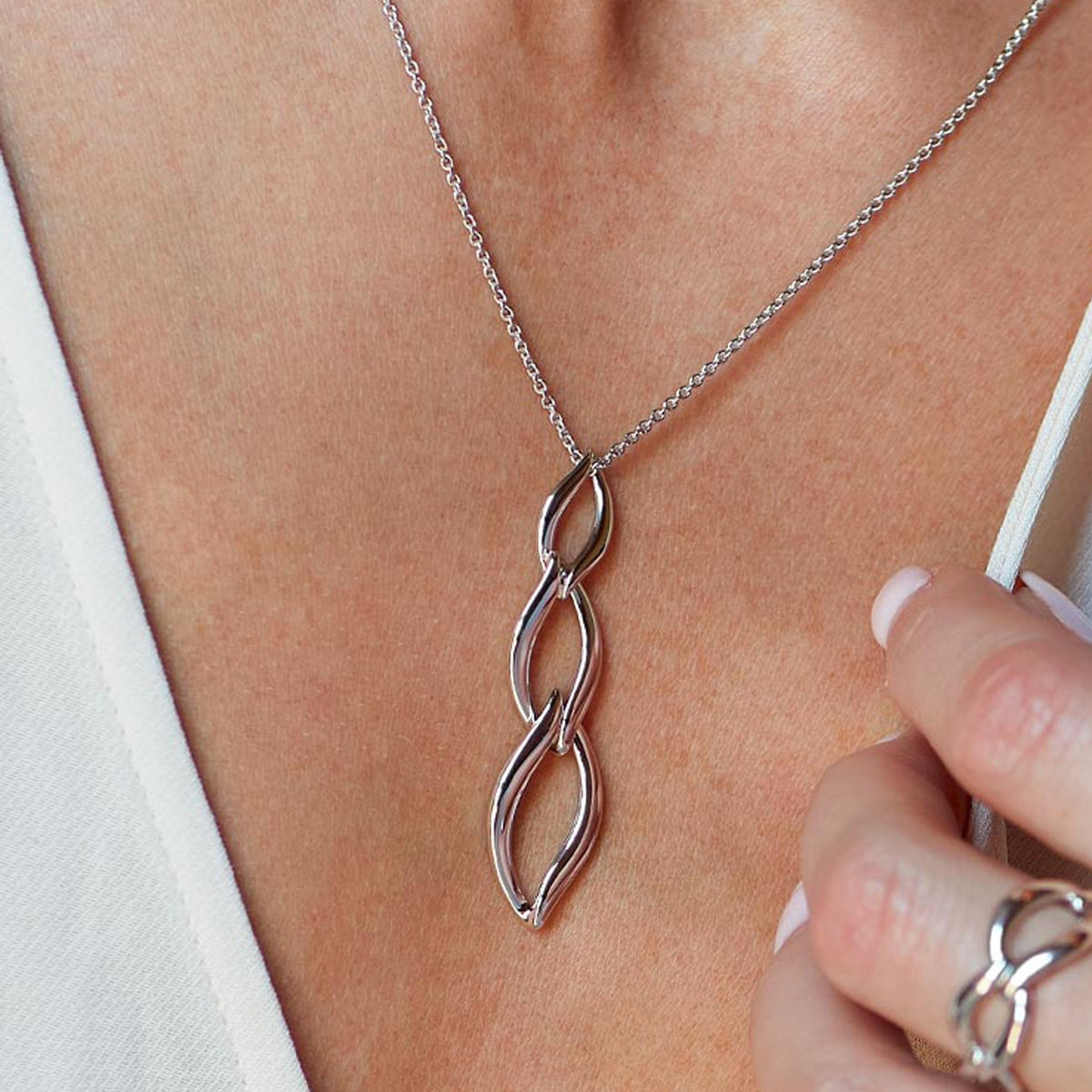 Kit Heath Entwine Twine Trio Link Necklace, a silver necklace from Kit Heath, available at OD’s Jewellers in St Helens.