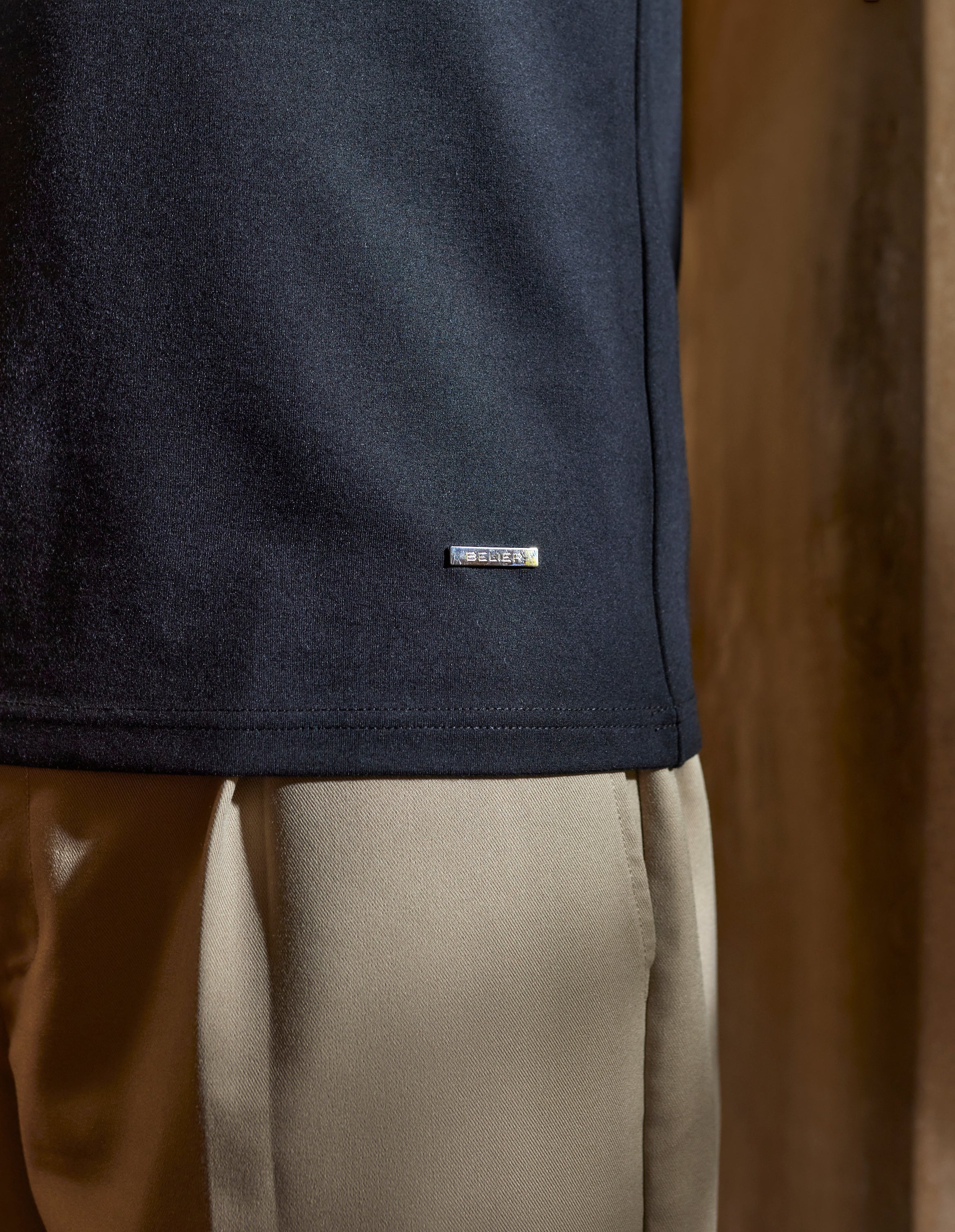 Metal branded tab