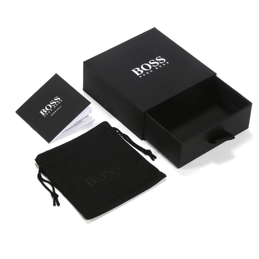 BOSS men's bracelet packaging: yellow gold plated chain inside branded jewelry box, pouch, and paperwork.