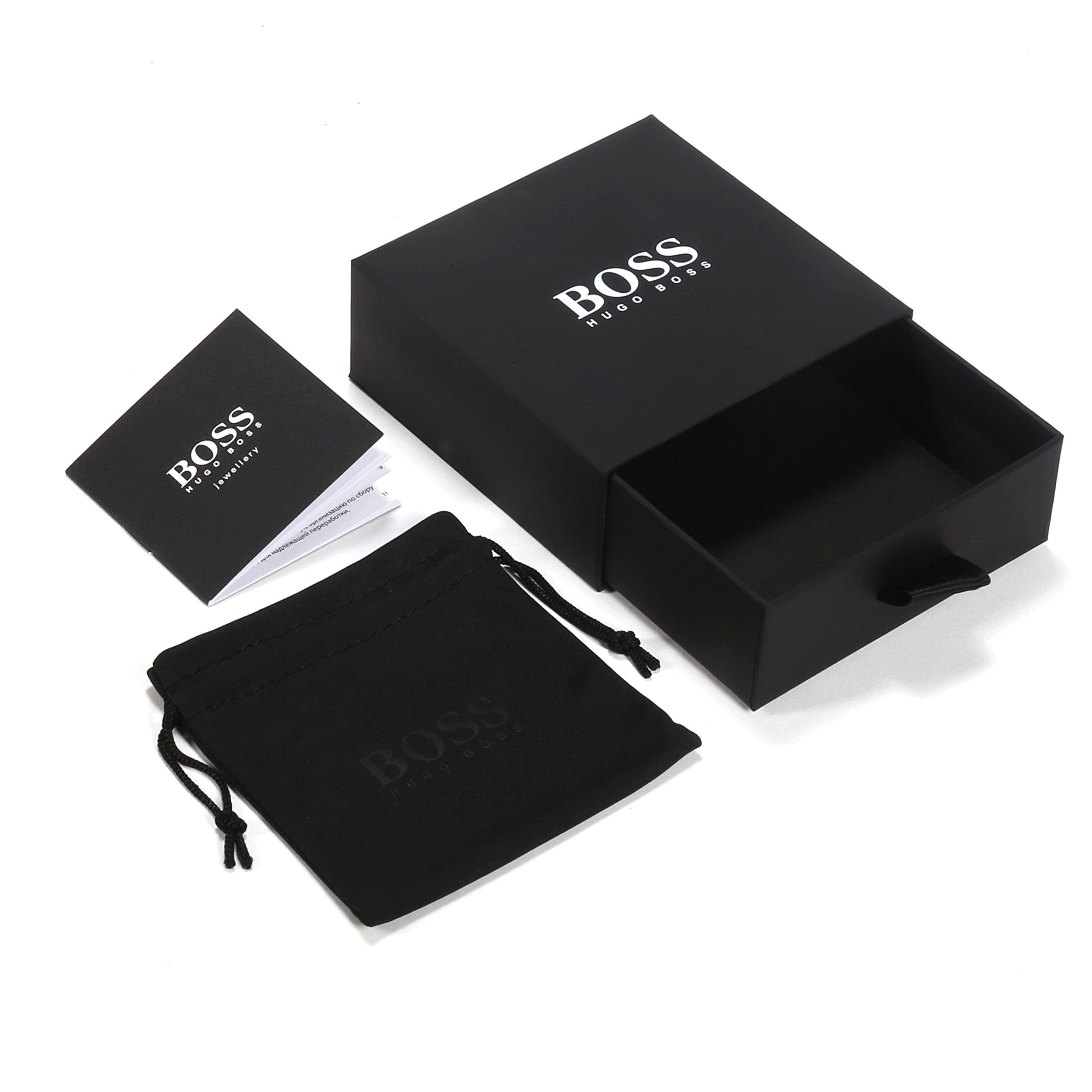 BOSS men's bracelet packaging: yellow gold plated chain inside branded jewelry box, pouch, and paperwork.