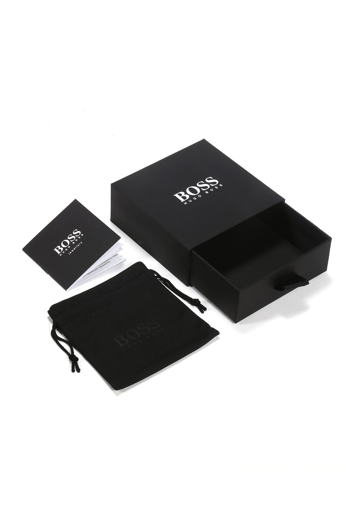 Close-up of the BOSS jewelry box, care instructions, and pouch included with the gold plated stainless steel chain.