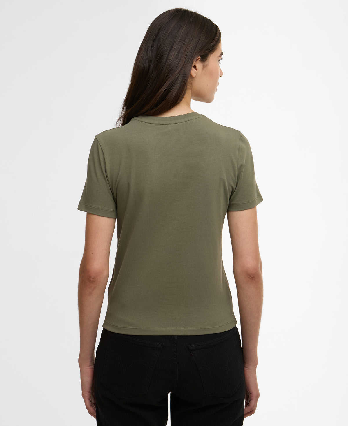 Person wearing a green t-shirt on a plain background