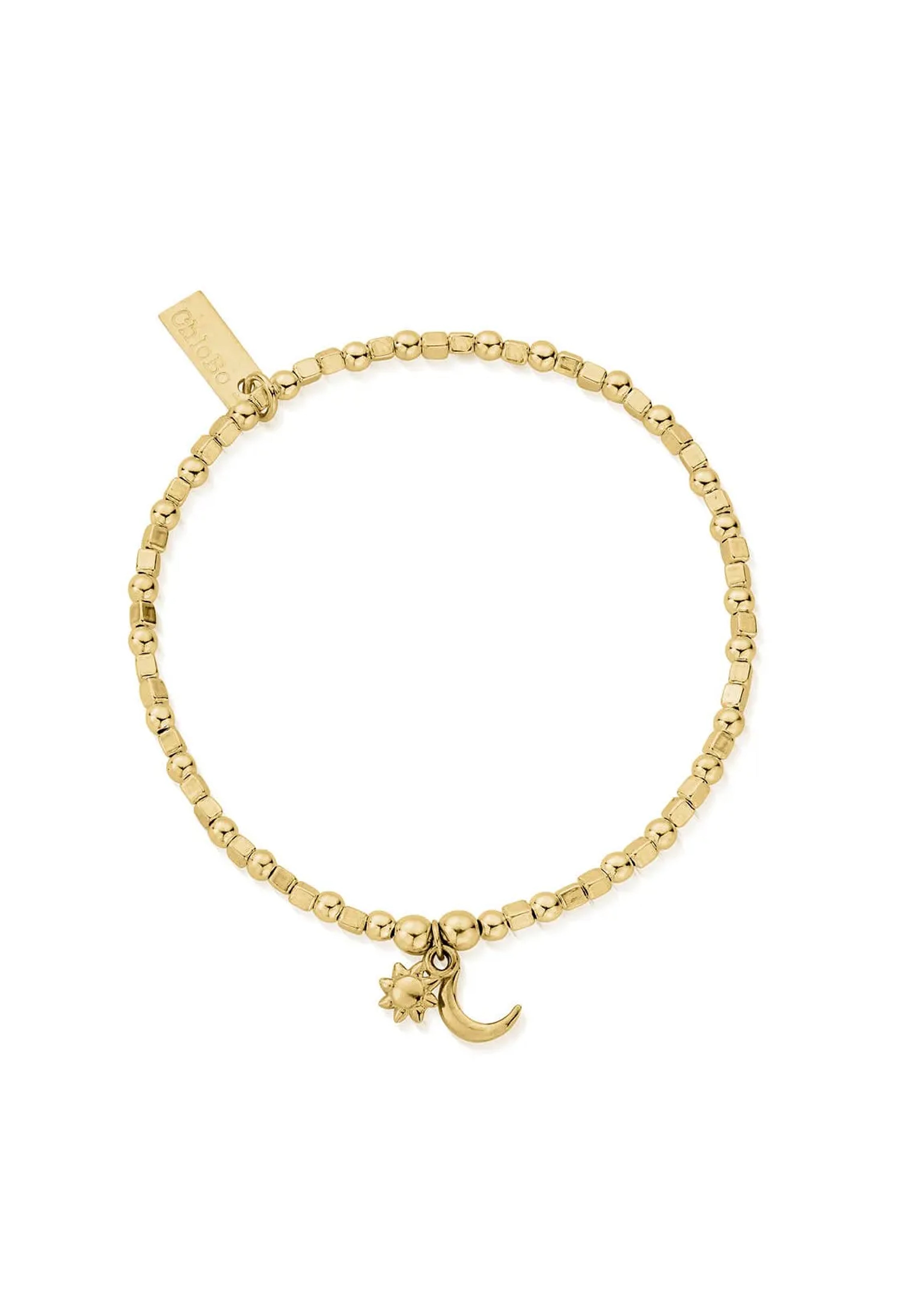 ChloBo Mini Cube bracelet, close-up. Gold-plated sun and moon charms detail the fine jewelry piece.