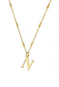 Close-up of ChloBo gold-plated "N" pendant necklace; stylish initial jewelry for personalized fashion statements.