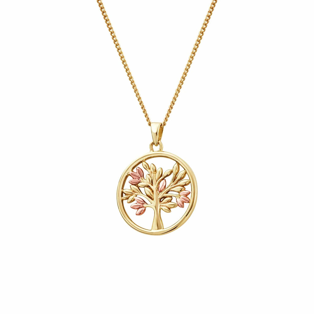 Gold chain necklace with a tree of life pendant featuring gold and pink leaves, set against a white background.
