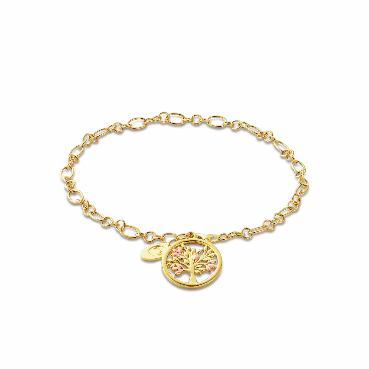 Gold chain link bracelet with gold tree charm.