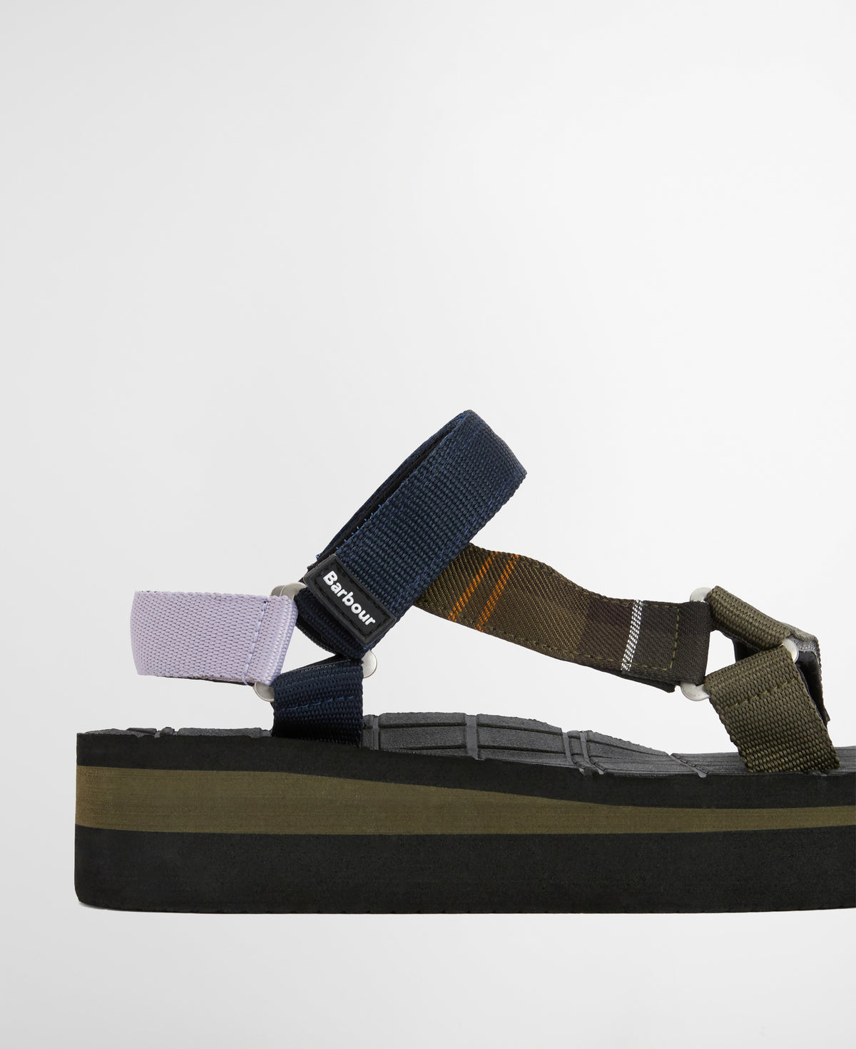 Multicolored sandal with multiple straps on a light gray background