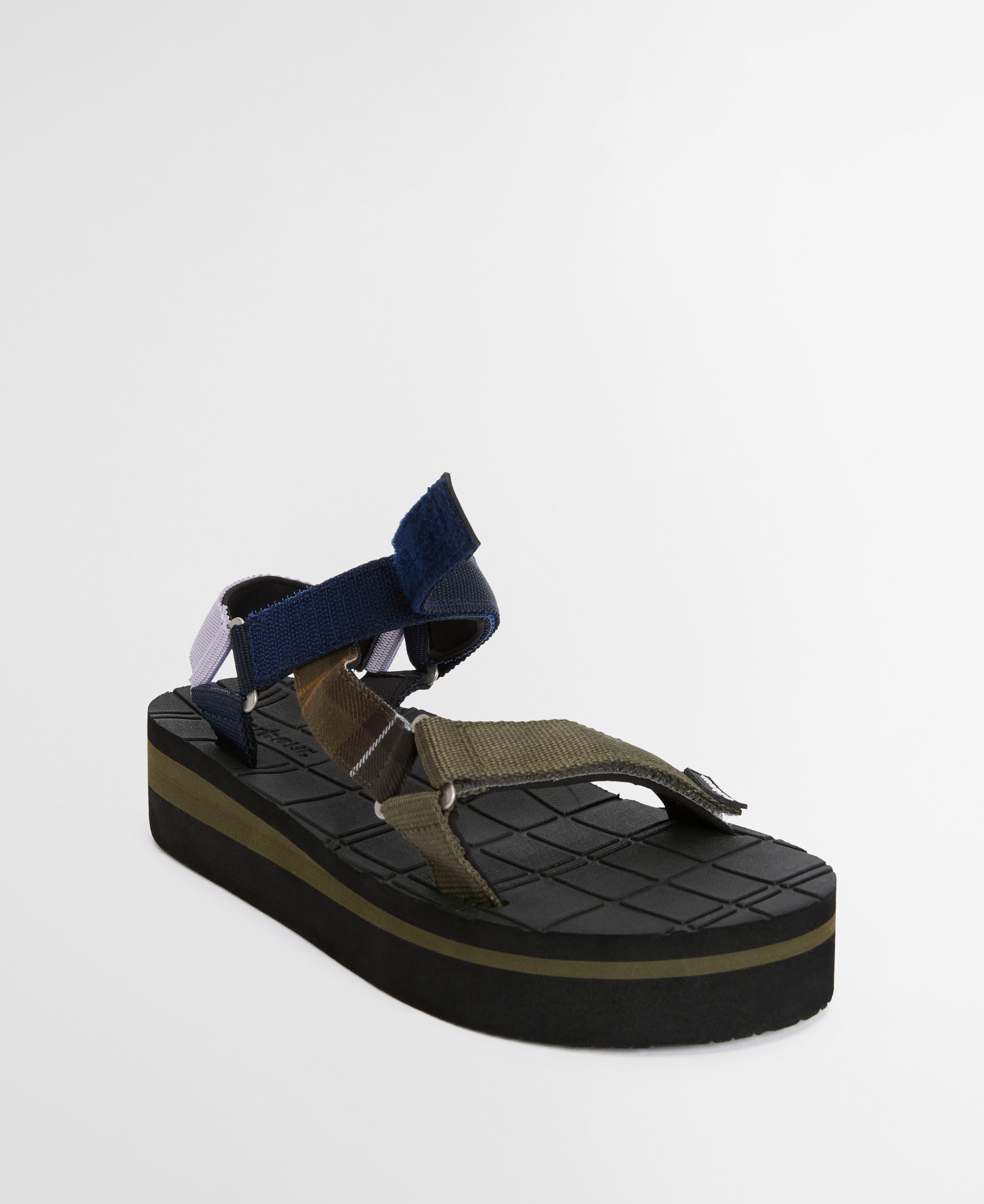 Multicolored sandal with black sole on a white background