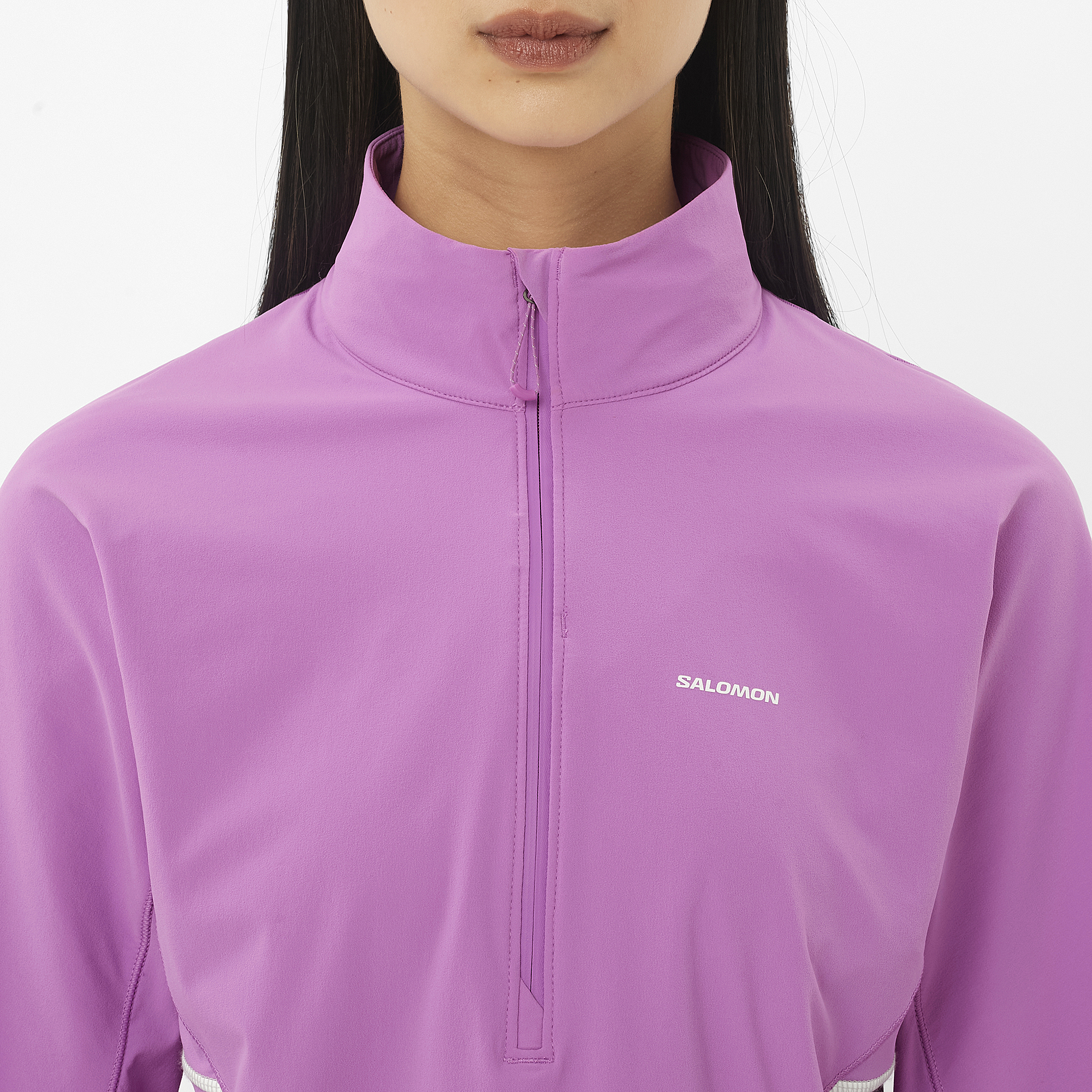 Purple jacket with Salomon logo on a white background