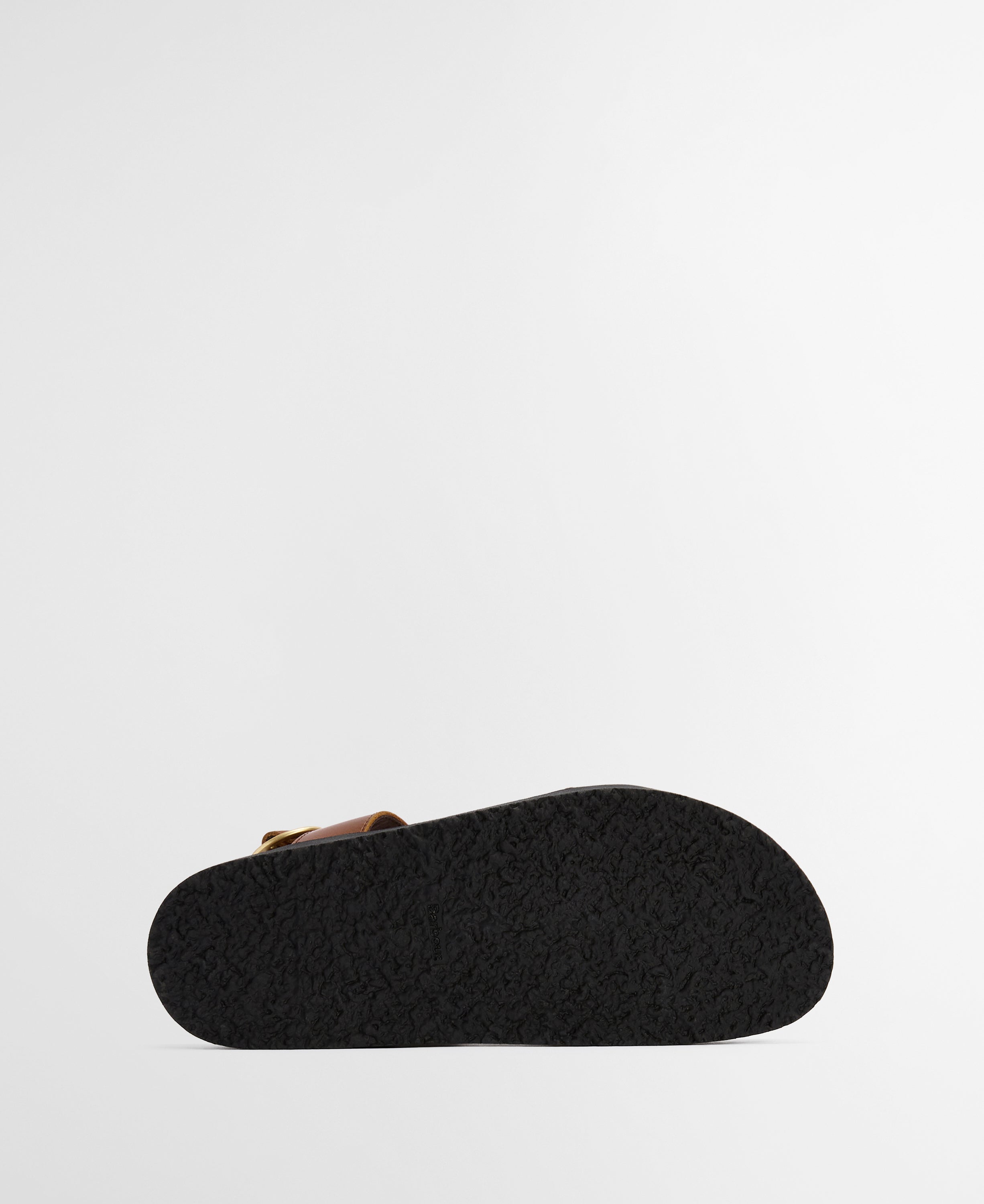 Black sandal sole on a light gray background