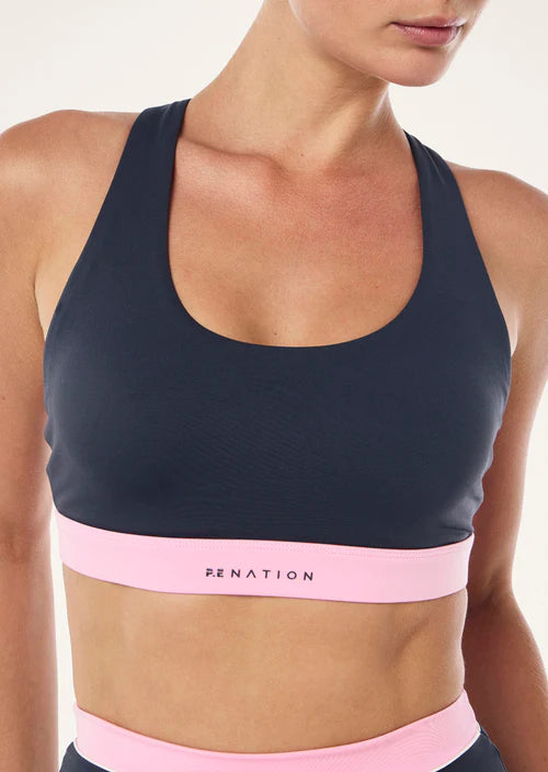 Women's P.E Nation Lumify Sports Bra in Marine Blue and pink
