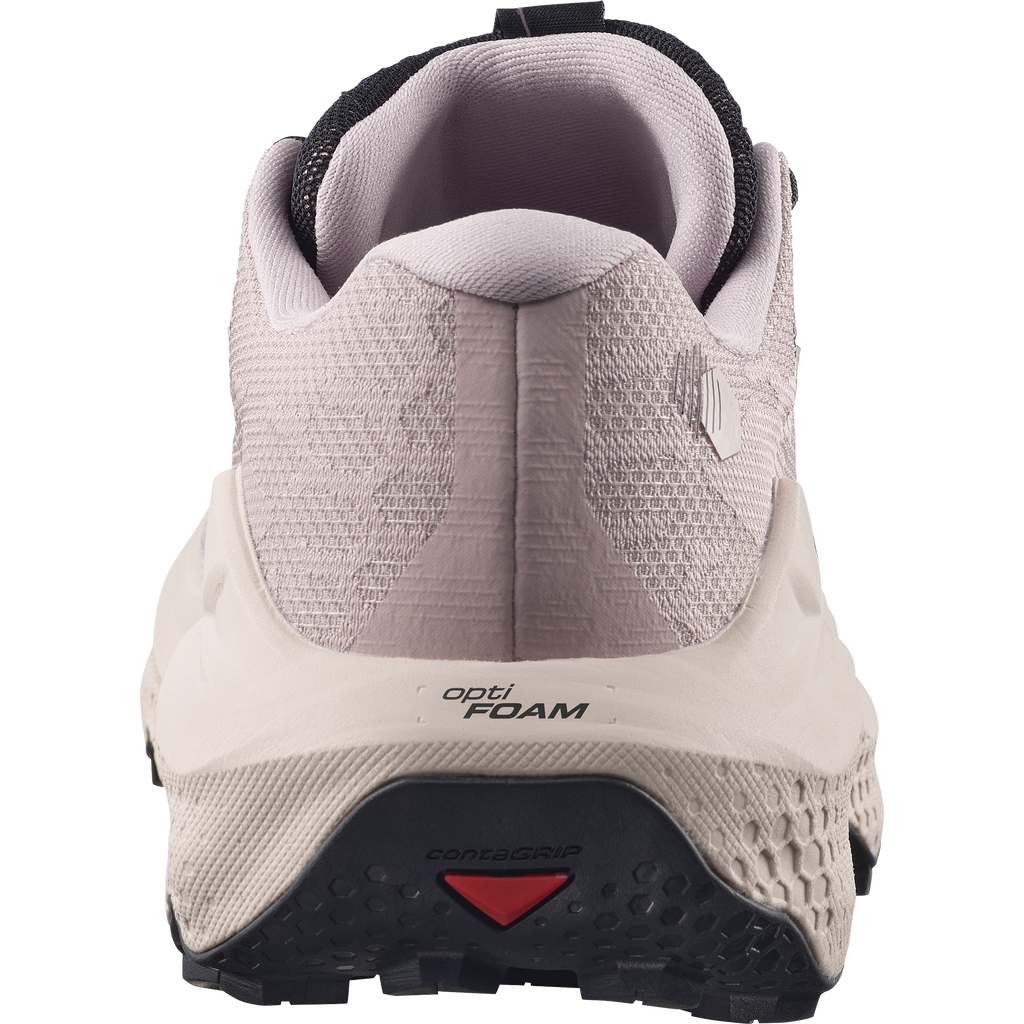 Close-up of a running shoe with 'Opti Foam' and 'Coflex' text on a white background