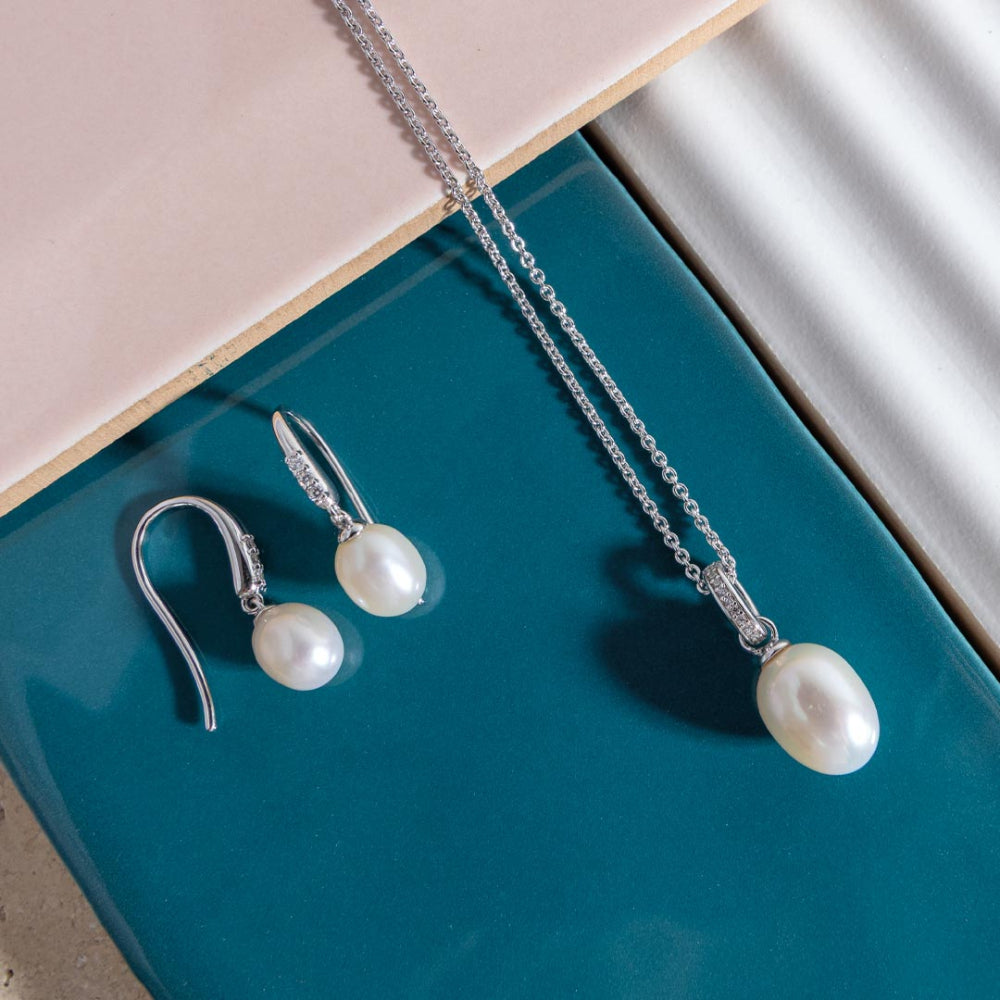 The Kit Heath Revival Pearl Glitz CZ Drop Earring, a white silver jewellery from Kit Heath, available at OD’s Jewellers in St Helens