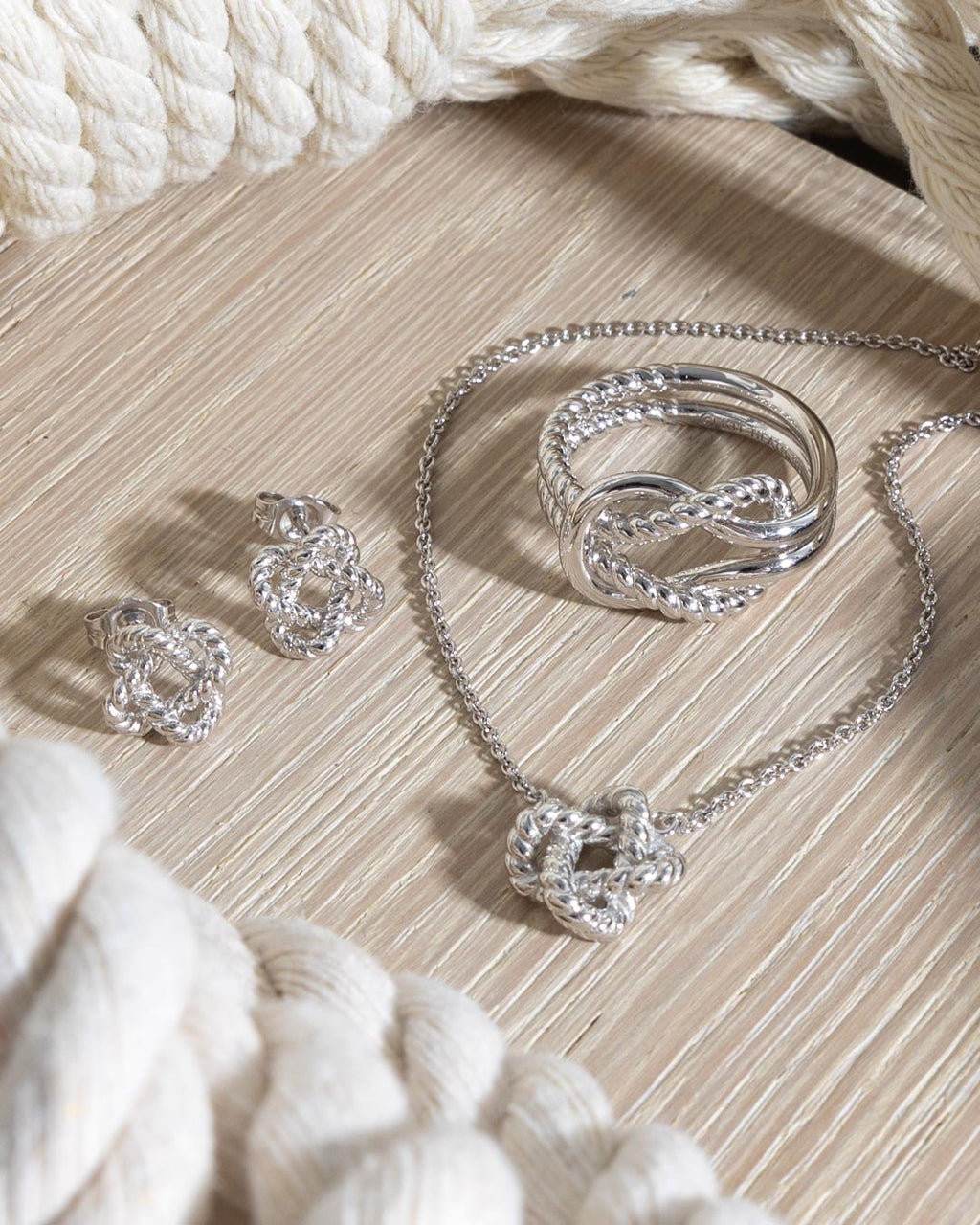 Marina Rope Knot Necklace on a styled background