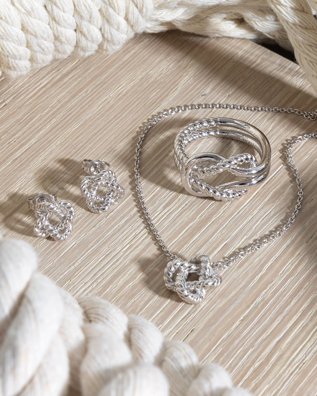Marina Rope Knot Necklace on a styled background