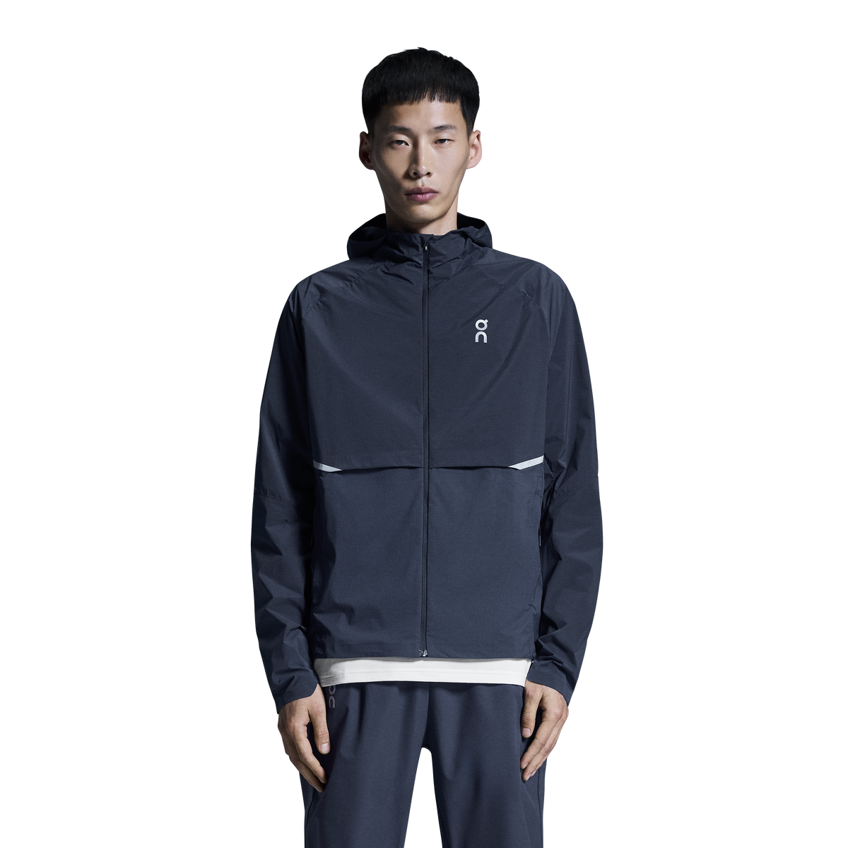 Men's On Running Midnight Core Jacket with chest reflective logo styled with on running midnight core pant