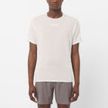 Men's Salomon Whisper White Sense Aero SS GFX T Shirt with tonal chest branding and rubberised graphic side print. styled with matching salomon shorts