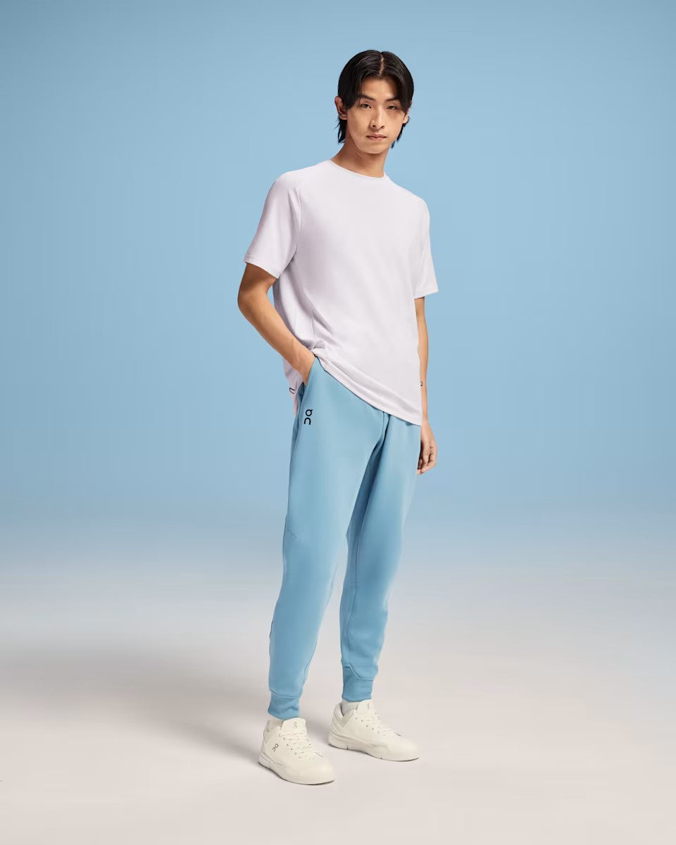 Mens On Running Coast Sweatpants with logo and zip pocket styled with on cloud trainers