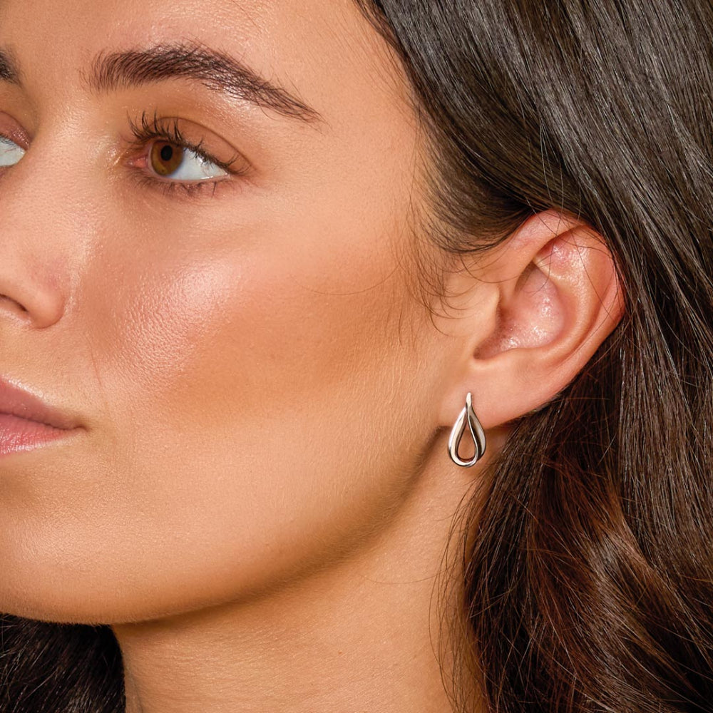 The Kit Heath Serenity Loop Grande Stud Earrings, a silver earrings from Kit Heath, available at OD’s Jewellers in St Helens