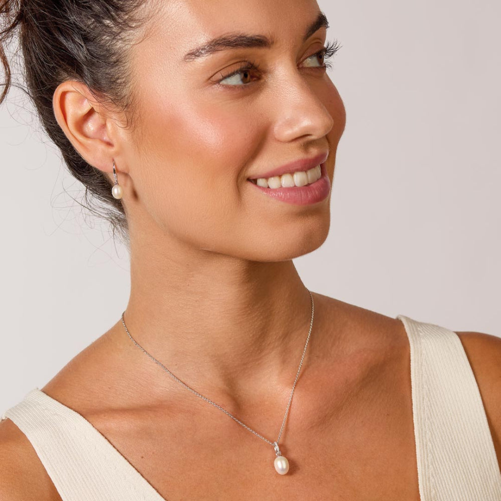 The Kit Heath Revival Pearl CZ Drop Earring, a silver pearl drop earring from Kit Heath, available at OD’s Jewellers in St Helens