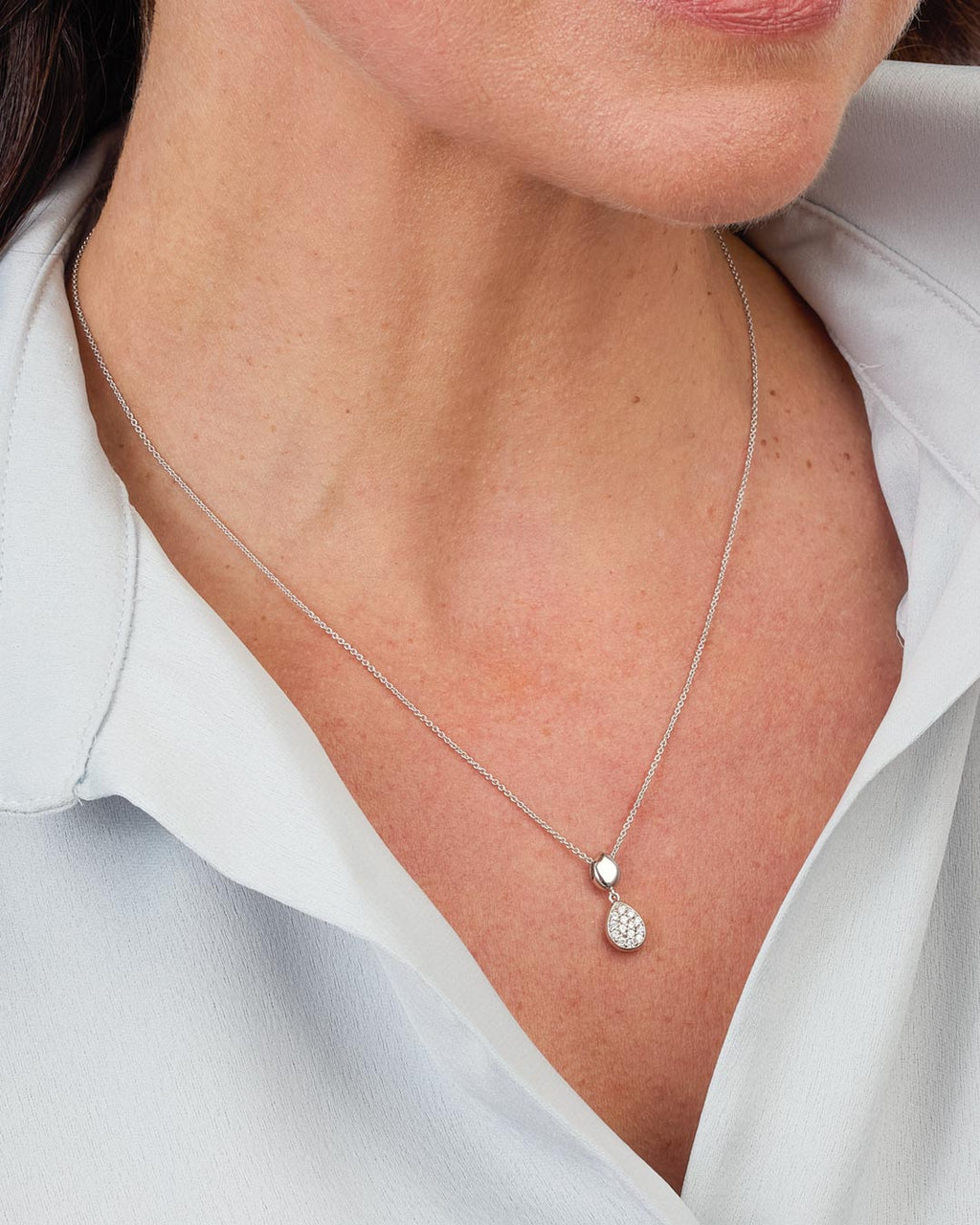 Model wears Coast Pebble Glisten Pavé Necklace