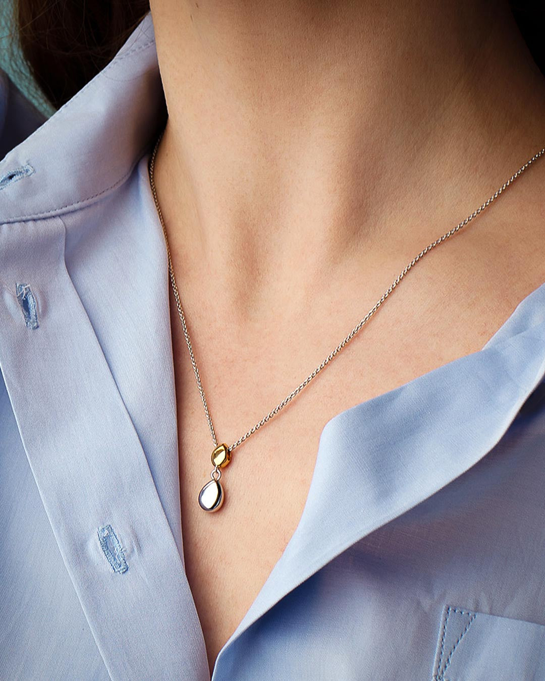 Model wears Coast Pebble Golden Necklace