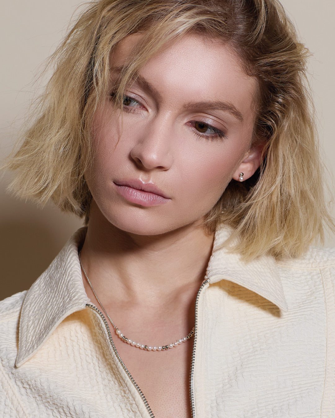 Model wears Coast Tumble Pearl Stud Earrings