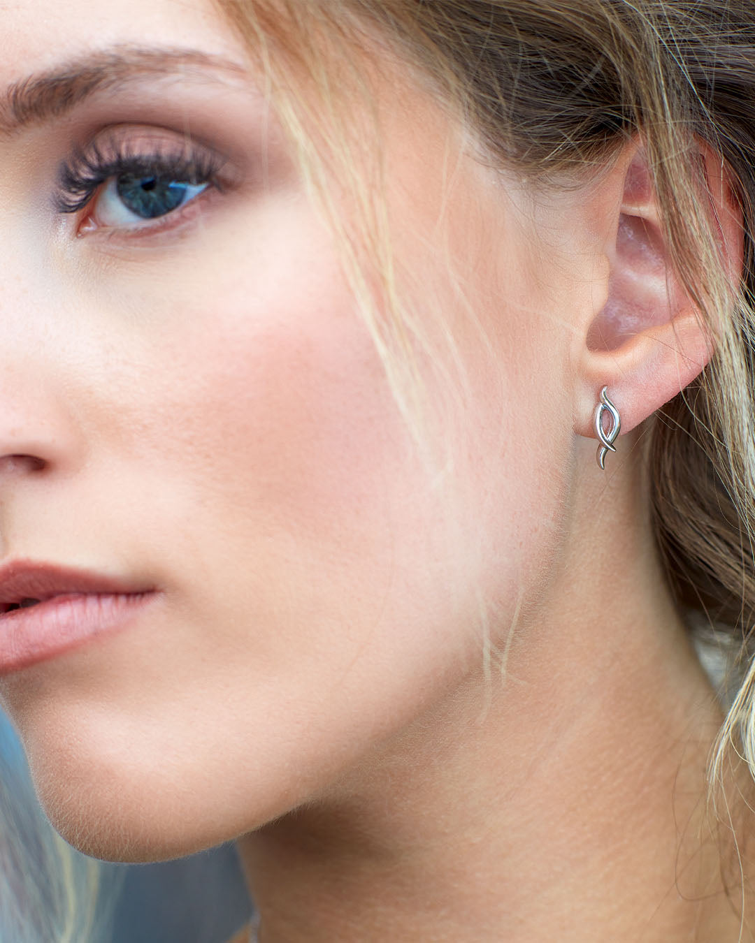 Model wears Entwine Twine Twist Statement Stud Earrings