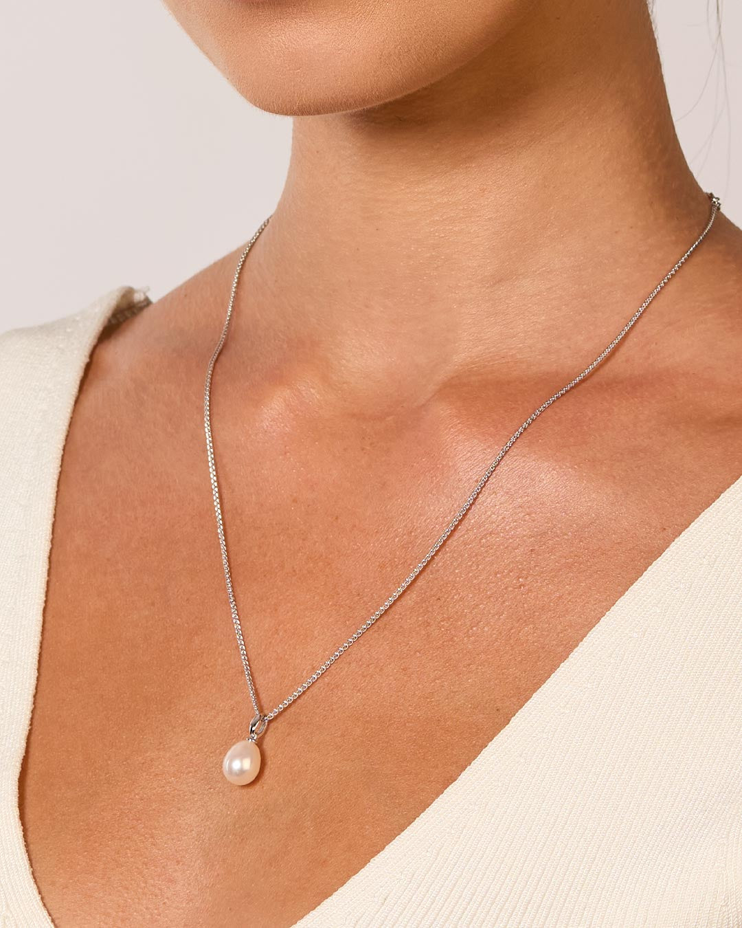 Model wears Revival Classic Pearl Necklace