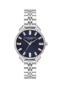 Olivia Burton watch showcasing its navy dial, art deco style details, and stainless steel bracelet.