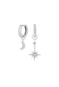 Silver Olivia Burton hoop earrings featuring celestial moon and star charms, studded with crystals.