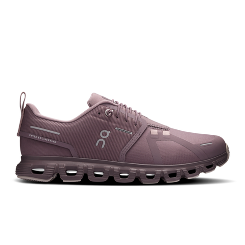 Purple running shoe on a white background