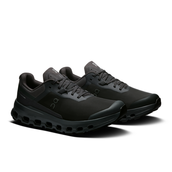 Black running shoes on a white background