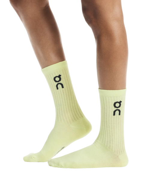 Light yellow socks with a logo on a white background