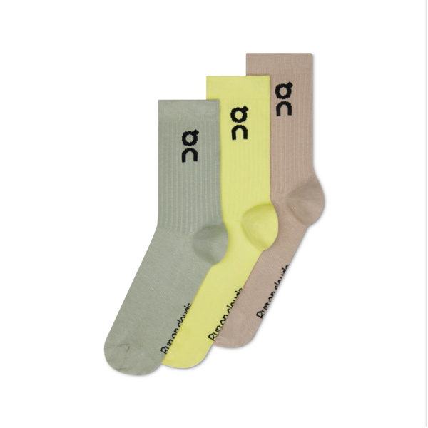 Three socks in gray, yellow, and beige with a brand logo on a white background