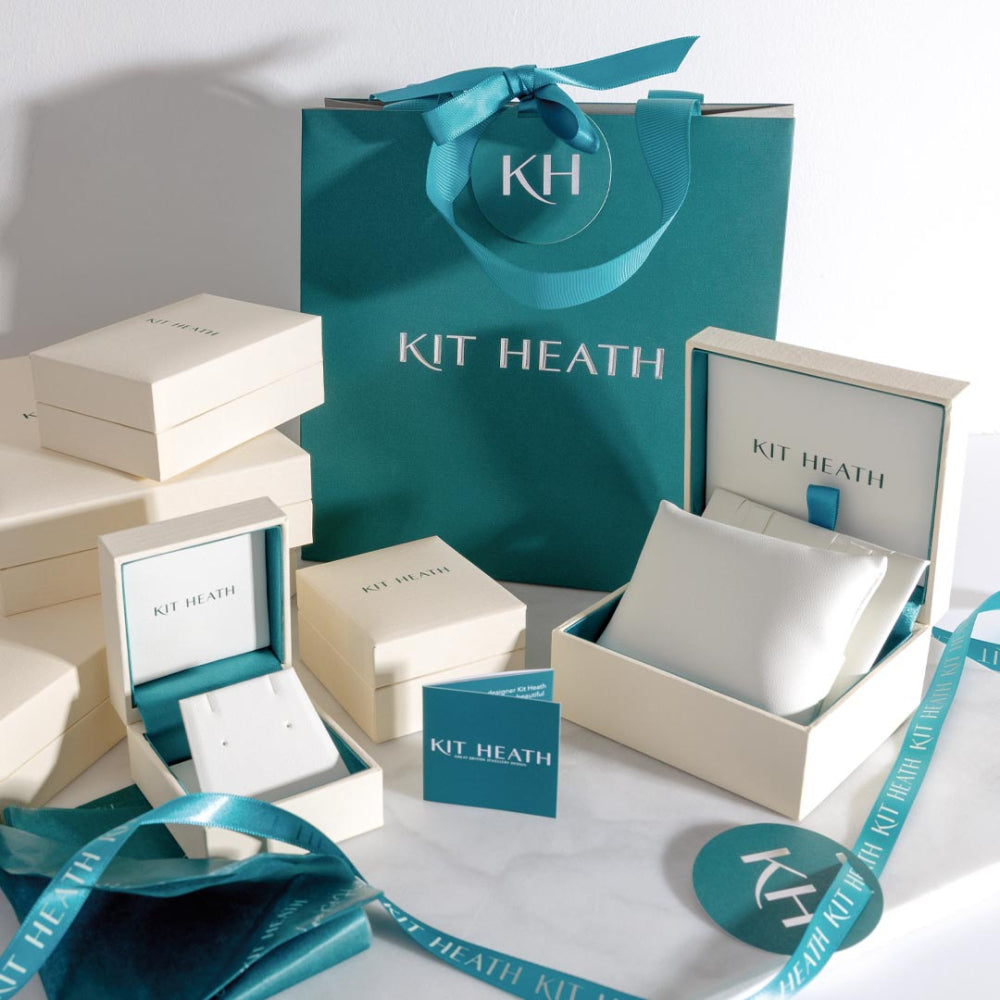 Alicia golden petite stud earrings, a gold metal earrings from Kit Heath, available at OD’s Jewellers in St Helens
