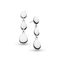 Silver dangle earrings with teardrop pendants.