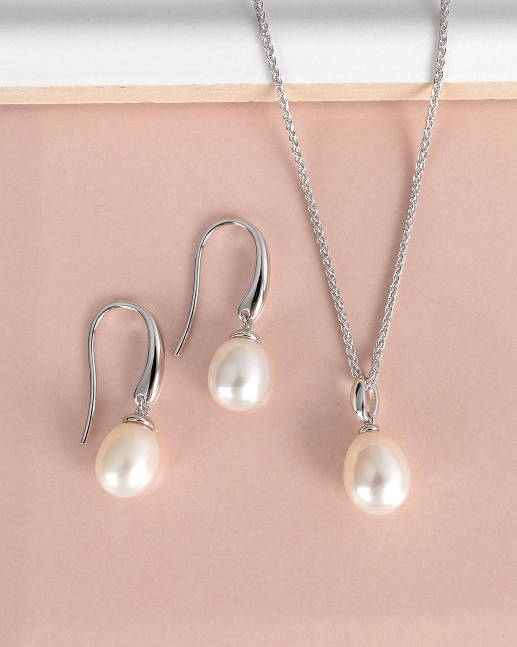 Revival Classic Pearl Necklace on a styled background