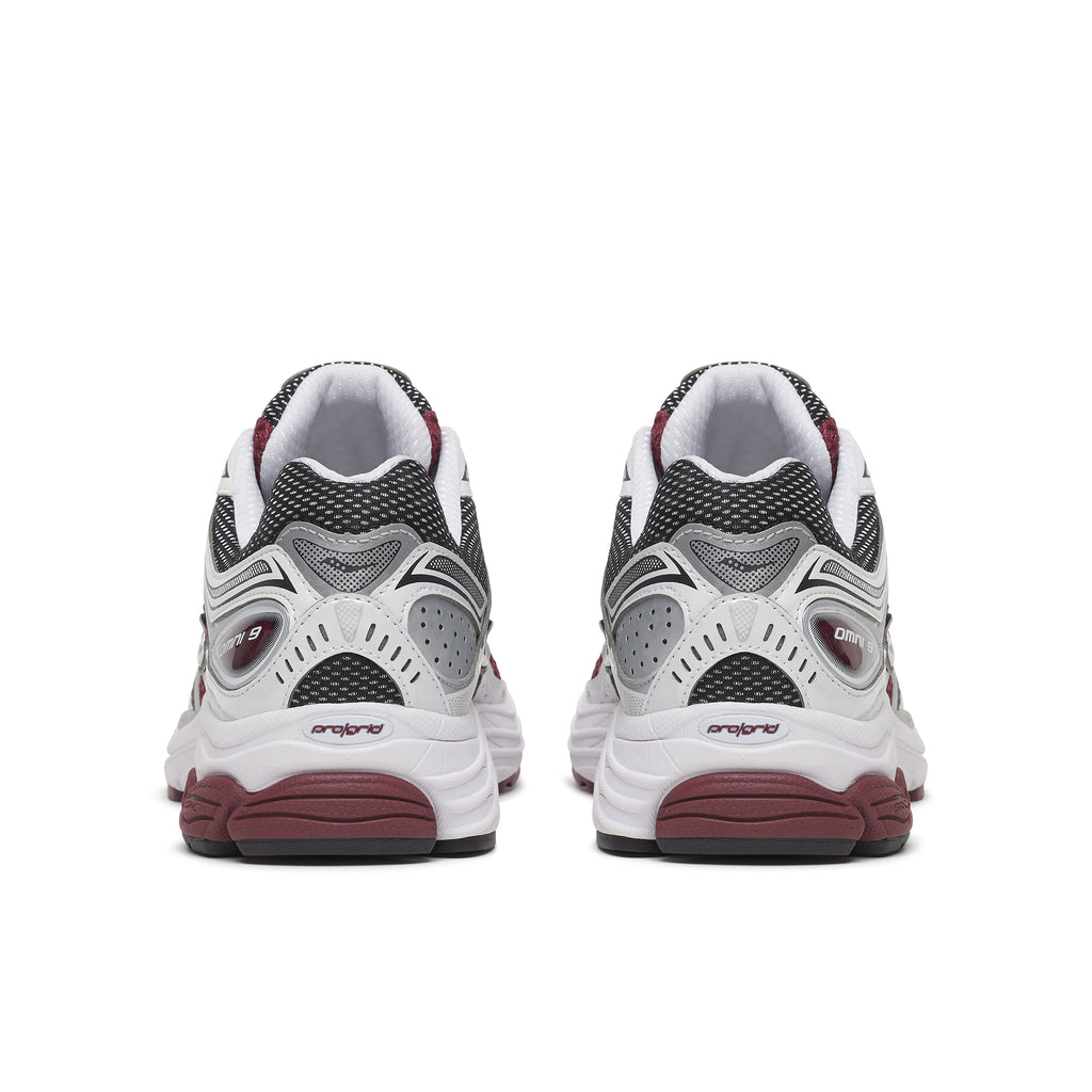 A pair of Saucony Omni 9  running shoes shown from the back, featuring a white and gray mesh upper with dark burgundy accents on the midsole and outsole.