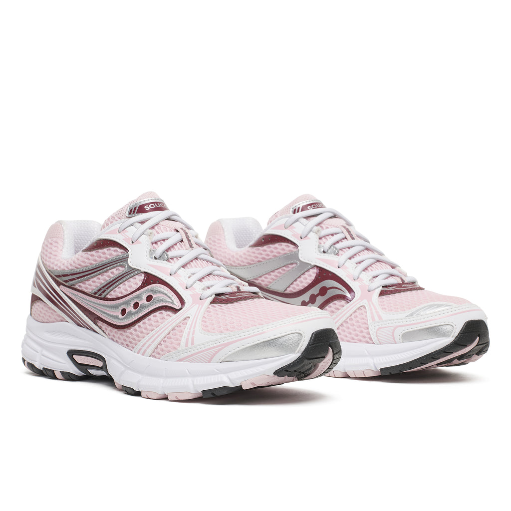 A pair of Saucony Grid legacy athletic sneakers in light pink, white, and burgundy, shown from a three-quarters angle on a white background.