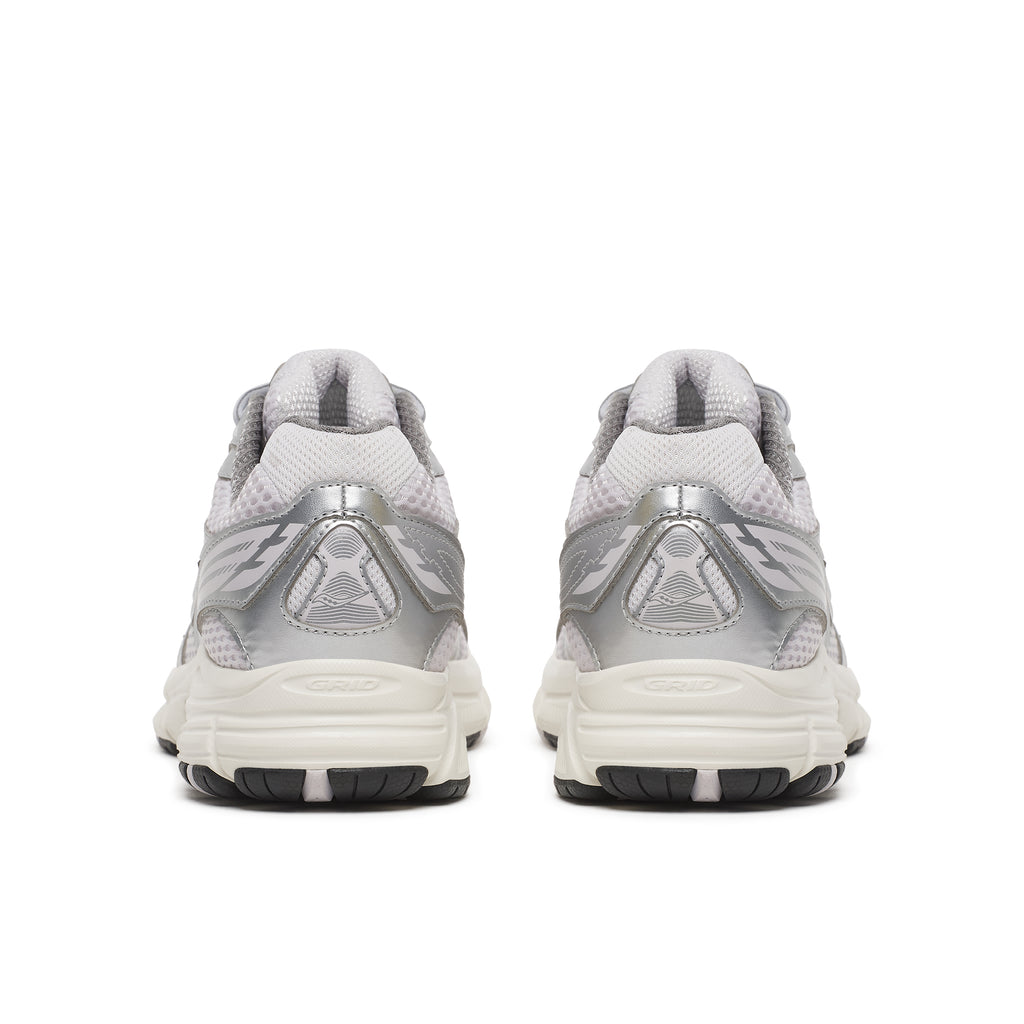 A pair of athletic saucony guide 7  sneakers shown from the back, featuring a metallic silver and light gray mesh upper with a thick white midsole and black outsole.