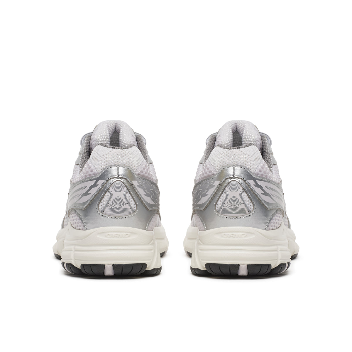 A pair of athletic saucony guide 7  sneakers shown from the back, featuring a metallic silver and light gray mesh upper with a thick white midsole and black outsole.