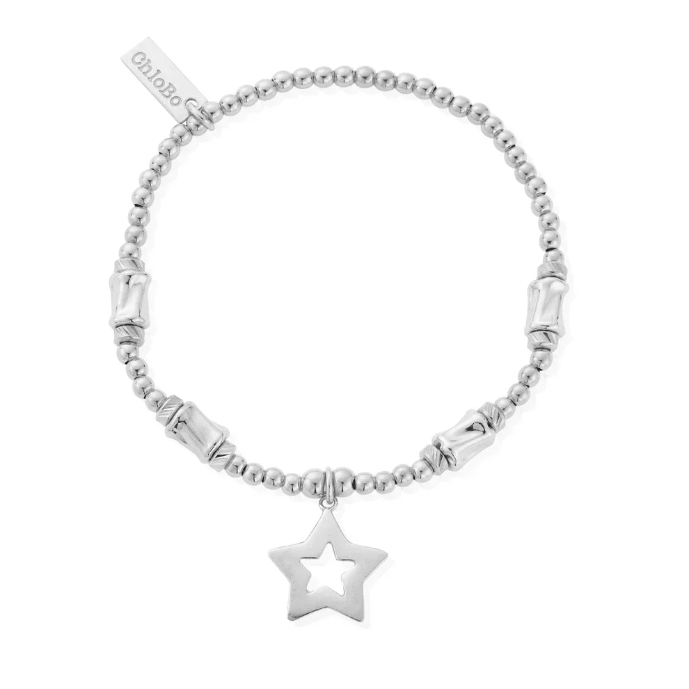 Silver beaded bracelet with star pendant.