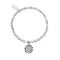 Silver beaded charm bracelet with a flower pendant.
